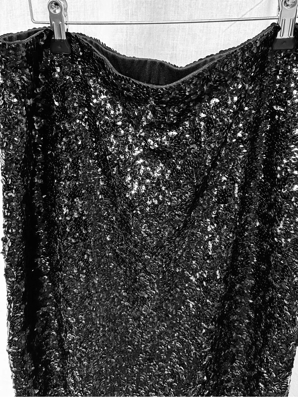 Black sequins formal pencil skirt appears all sequins in place. XL